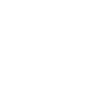 Smiling female dentist in white coat holding dental tools in modern clinic setting.
